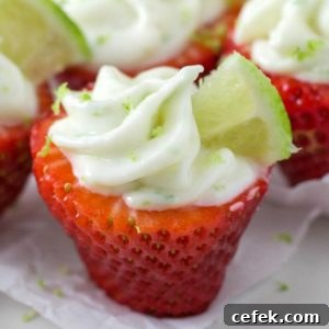 strawberry stuffed with lime cheesecake filling on a table