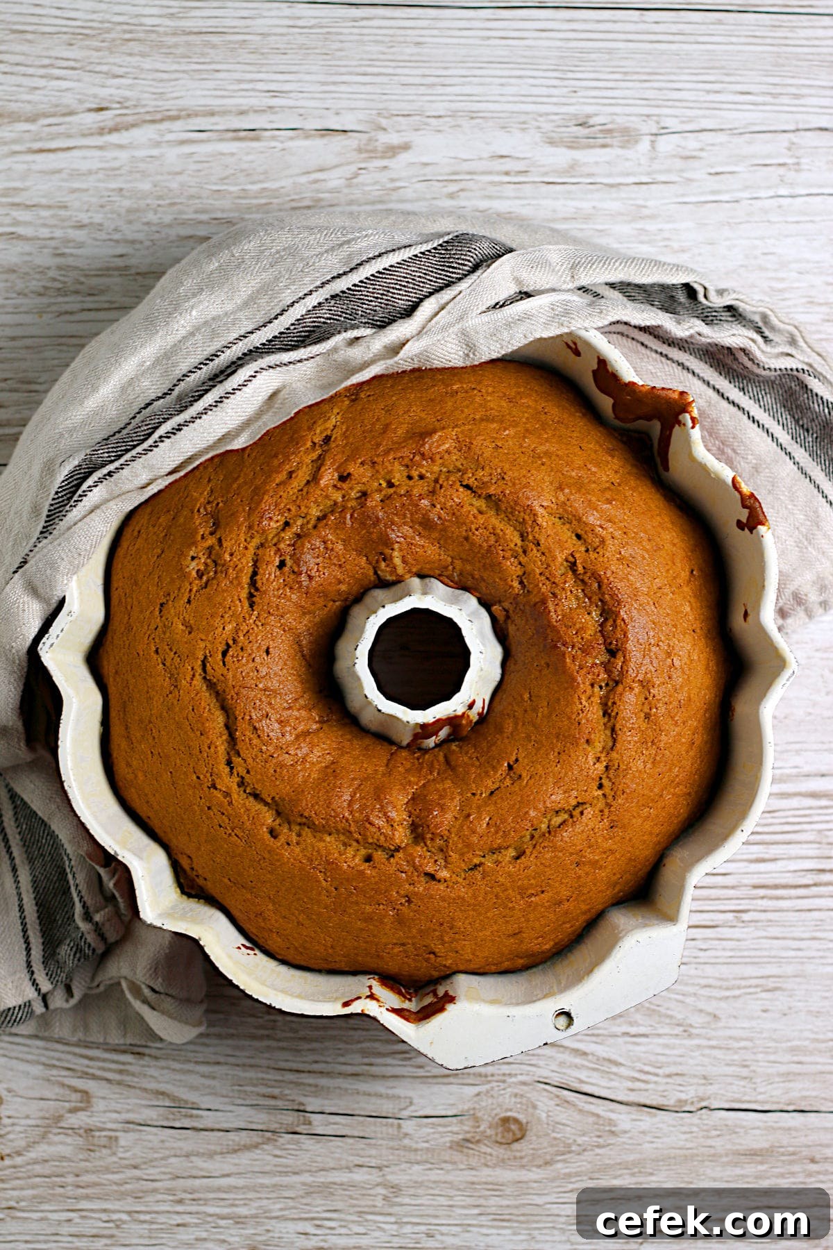 A Pumpkin Spice Bundt Cake in a bundt pan.