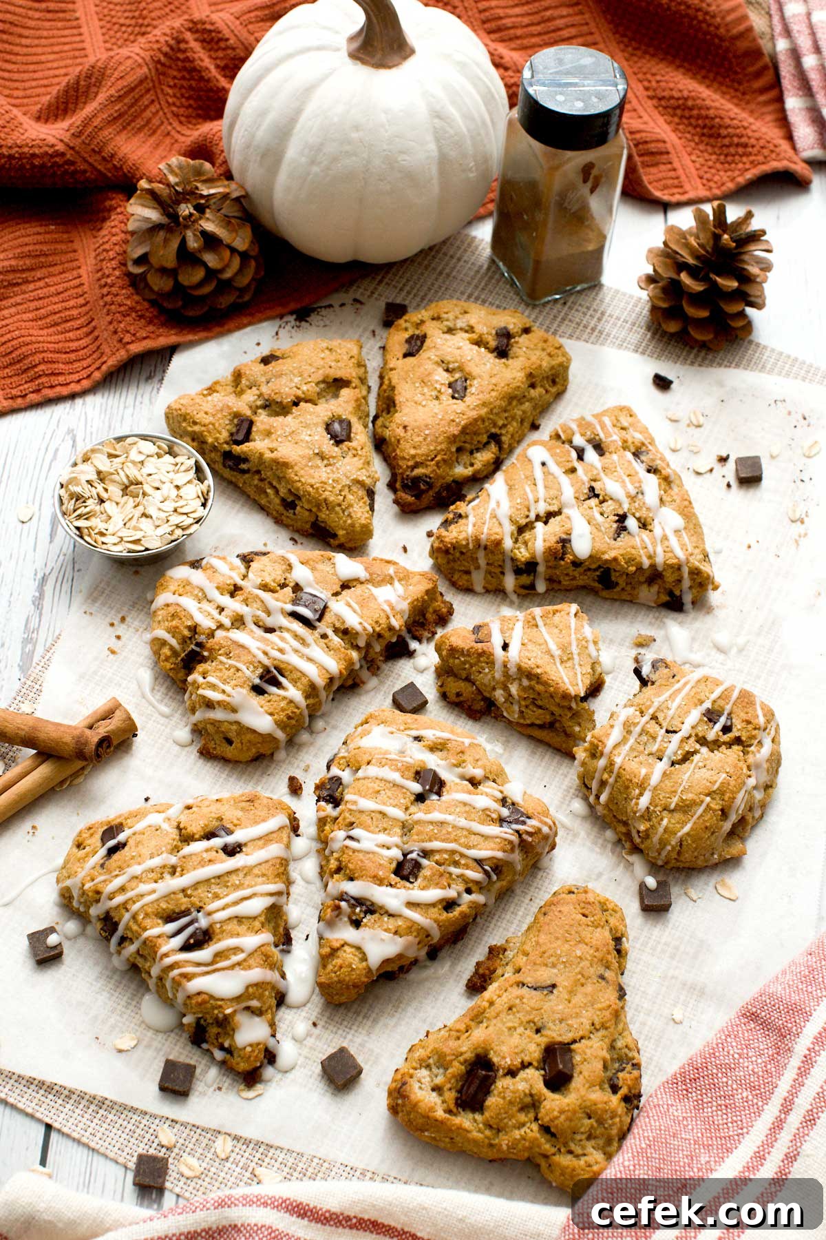 Pumpkin cottage cheese scones with chocolate chunks and glaze on top.