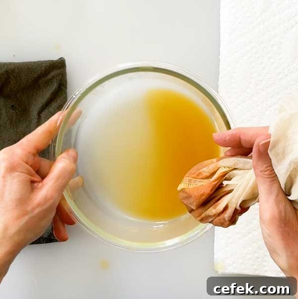 The excess liquid squeezed out of the pumpkin puree.