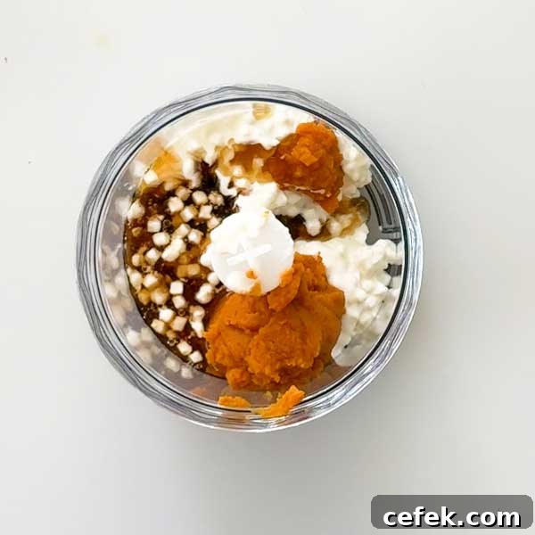 Adding the wet ingredients to a chopper cup.