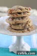 chocolate chip cookies stacked on cake stand