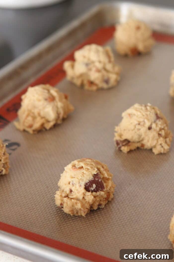 cookie dough scooped onto baking sheet
