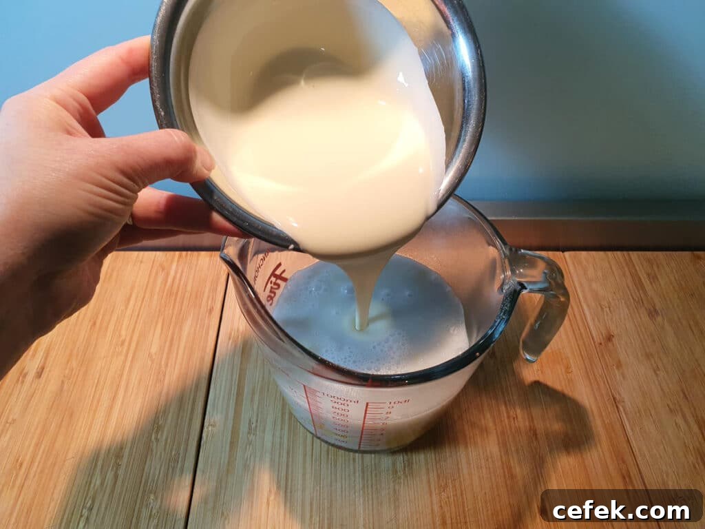 adding cream to ice cream mix.