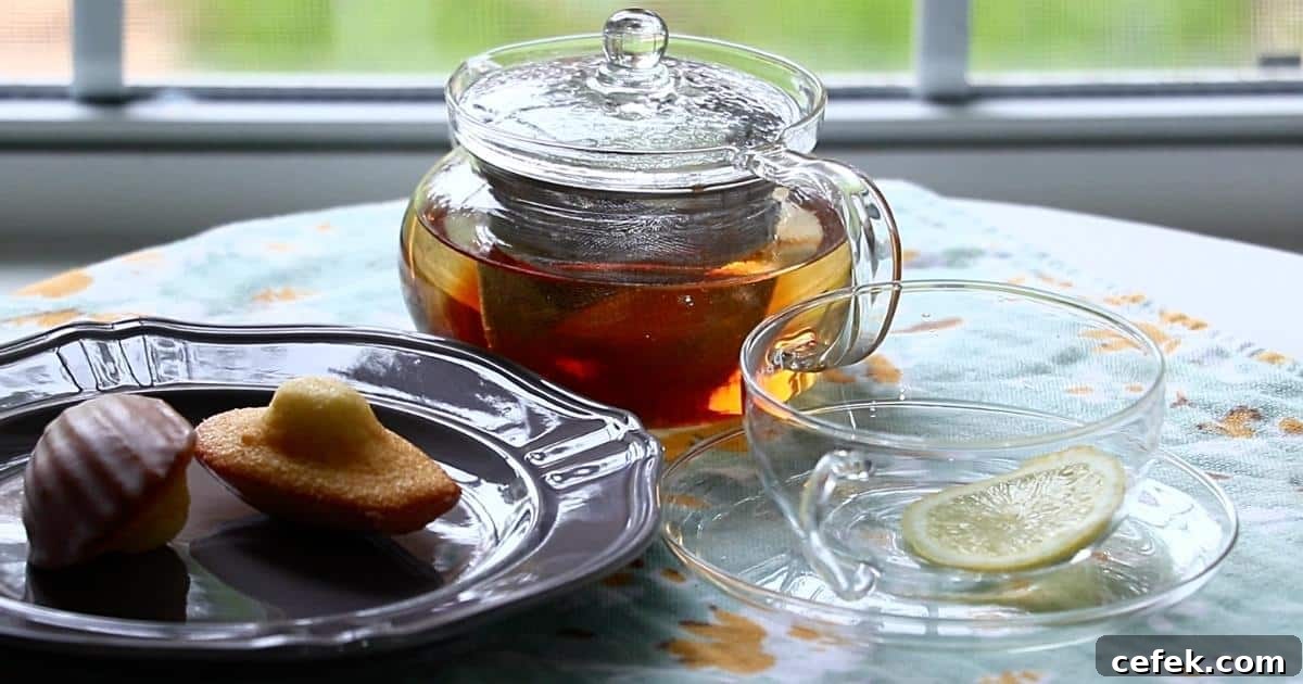 2 lemon madeleines with a tea on a table