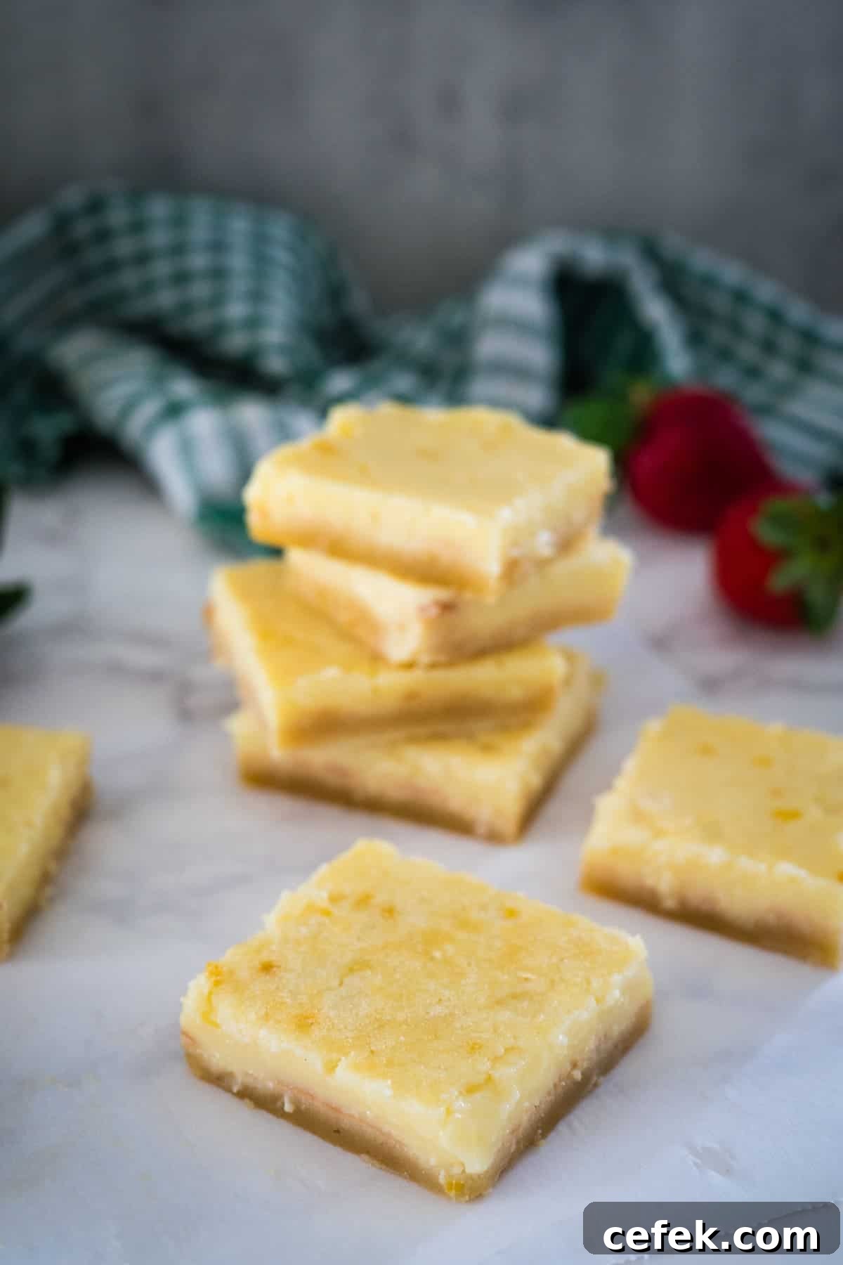 Lemon bars stacked on top of each other.