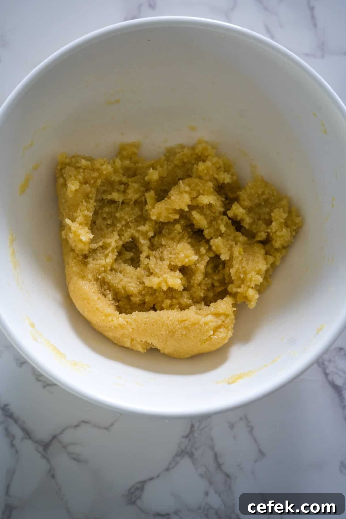 A bowl of yellow food.