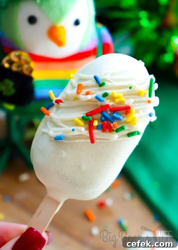 white chocolate cake pops with rainbow sprinkles for St. Patrick’s Day