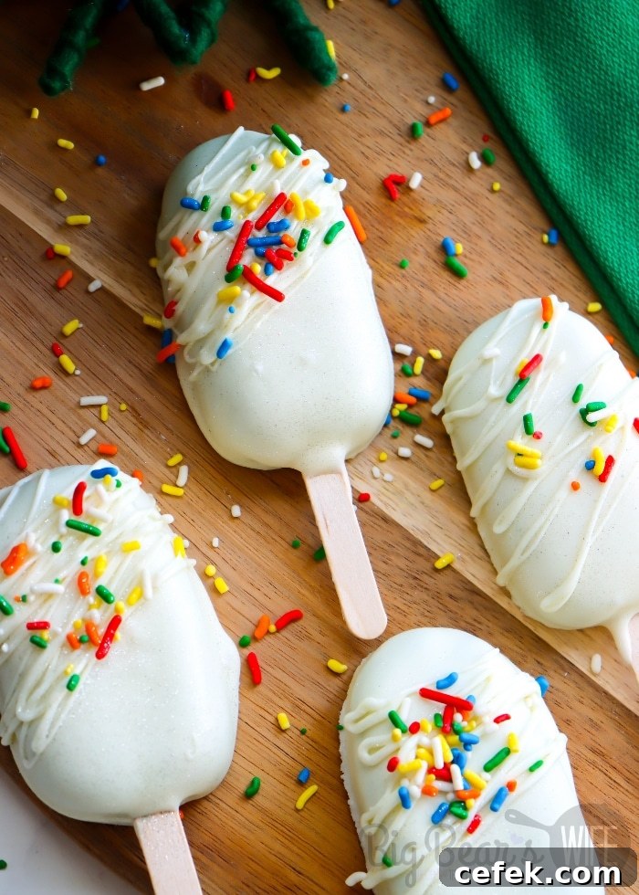 rainbow sprinkle St. Patrick’s Day cake pops on popsicle sticks