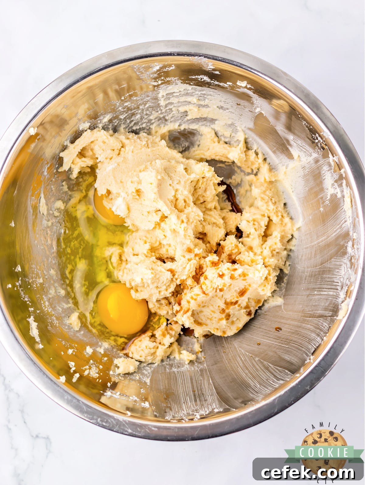 Add egg and vanilla to cookie dough.