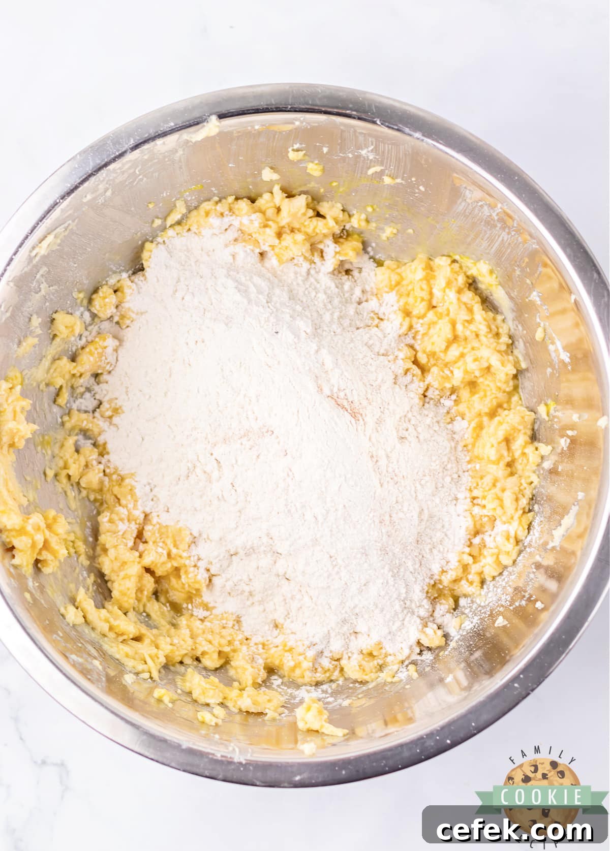 Add the dry ingredients to the creamed butter/sugar mixture.