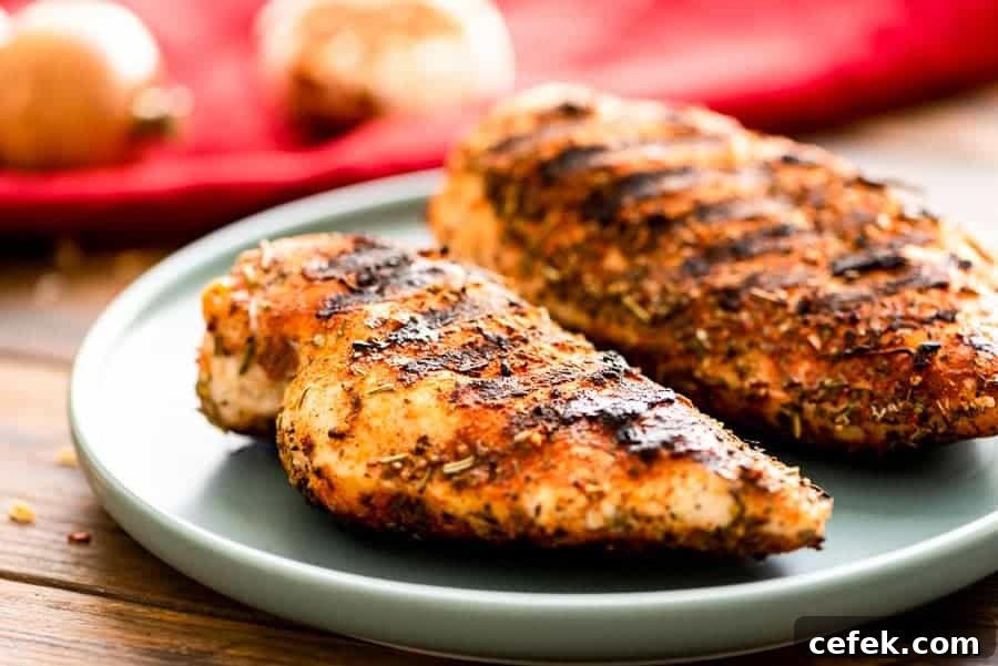 Grilled chicken breasts on plate