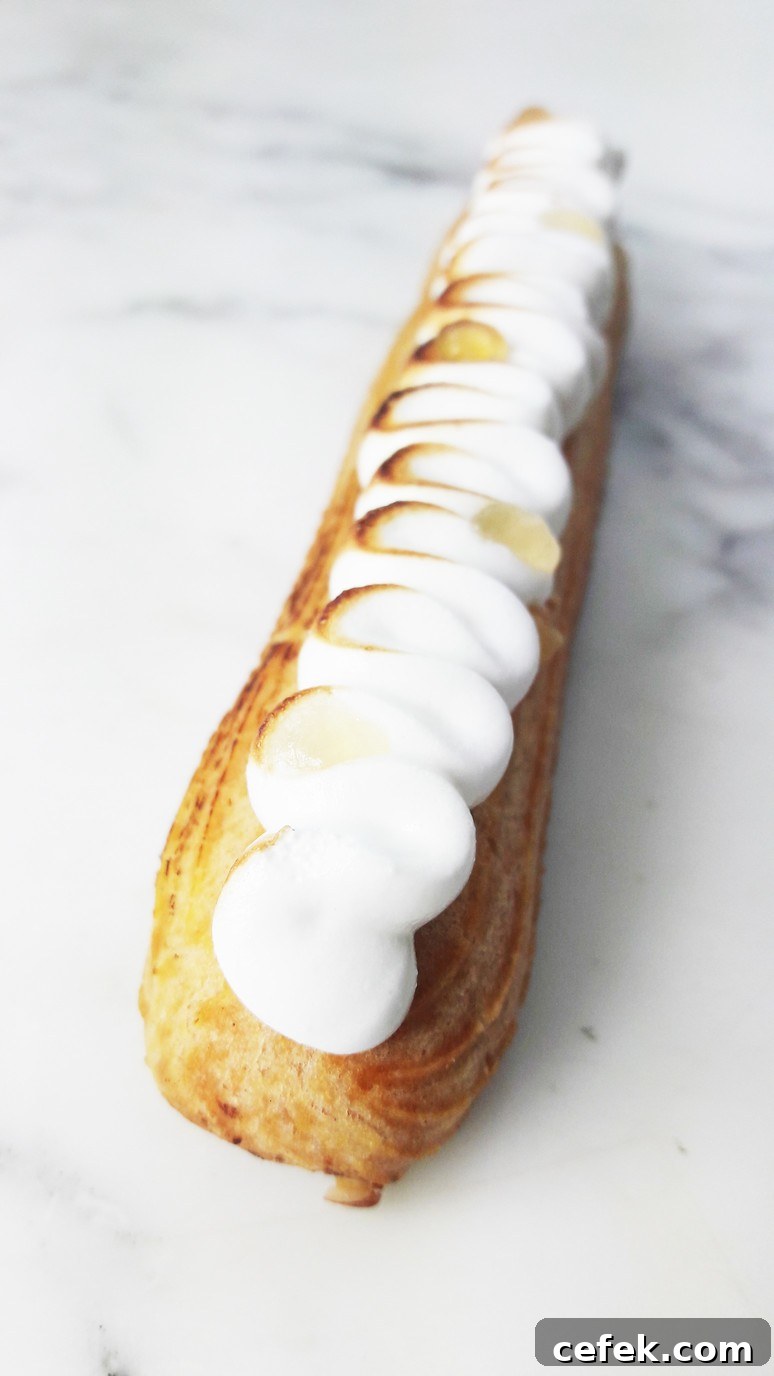 Lemon Meringue Eclair at Casse Noisette Paris. Pastry Chef extraordinaire Jeffrey Cagnes. Pastries in Paris.