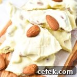 Up close view of pieces of white chocolate almond bark