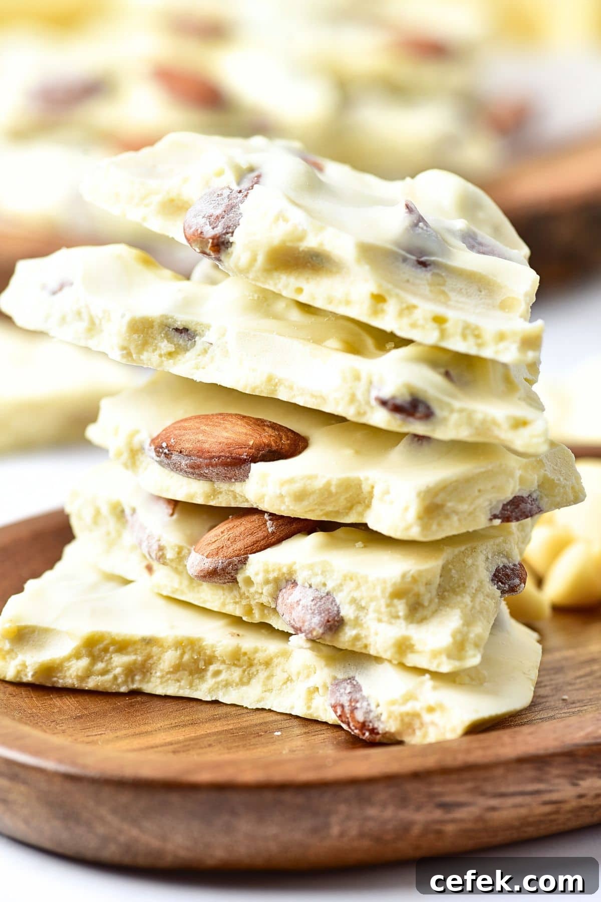 Up close view of a stack of almond bark white chocolate.