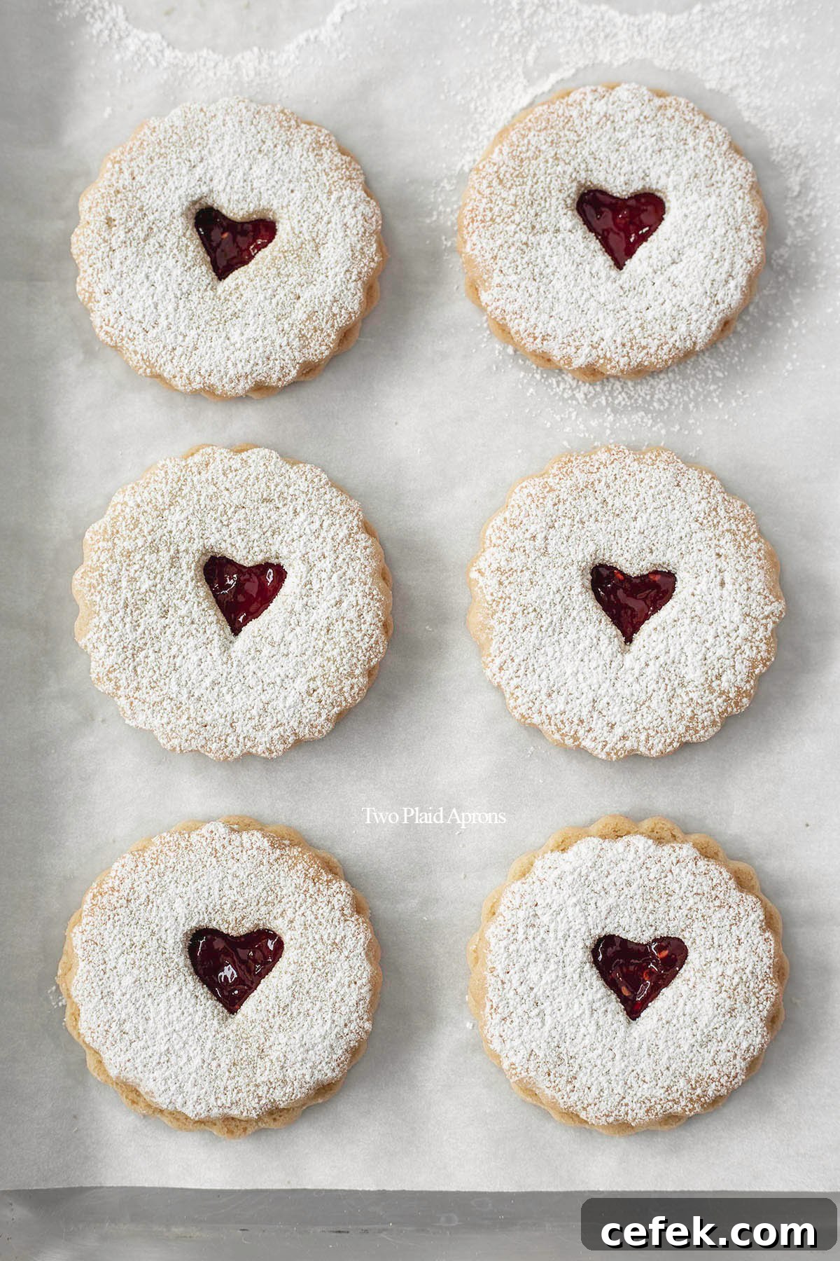 Linzer cookies with almond flour and raspberry jam.