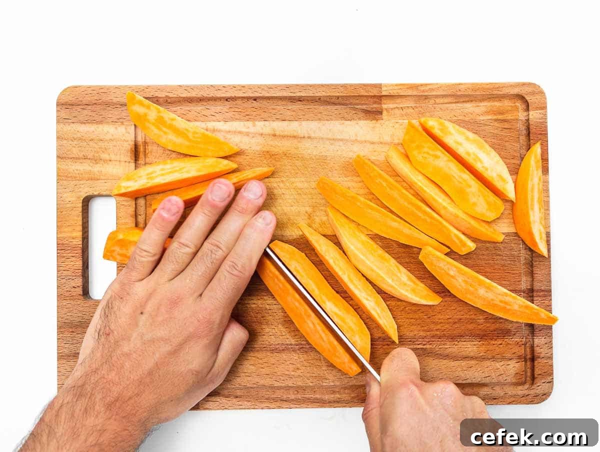 cutting the sweet potatoes into wedges