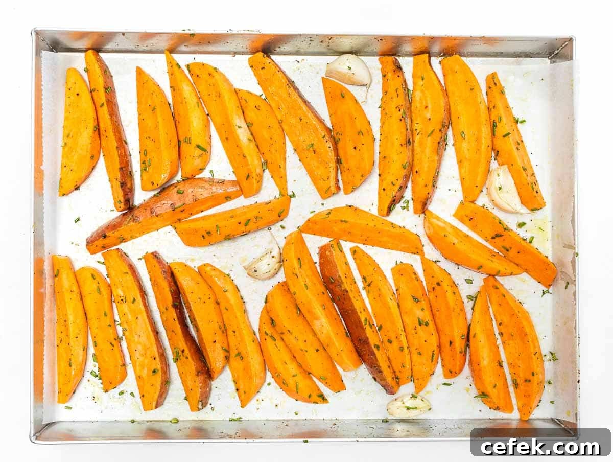 sweet potato wedges arranged on baking sheet
