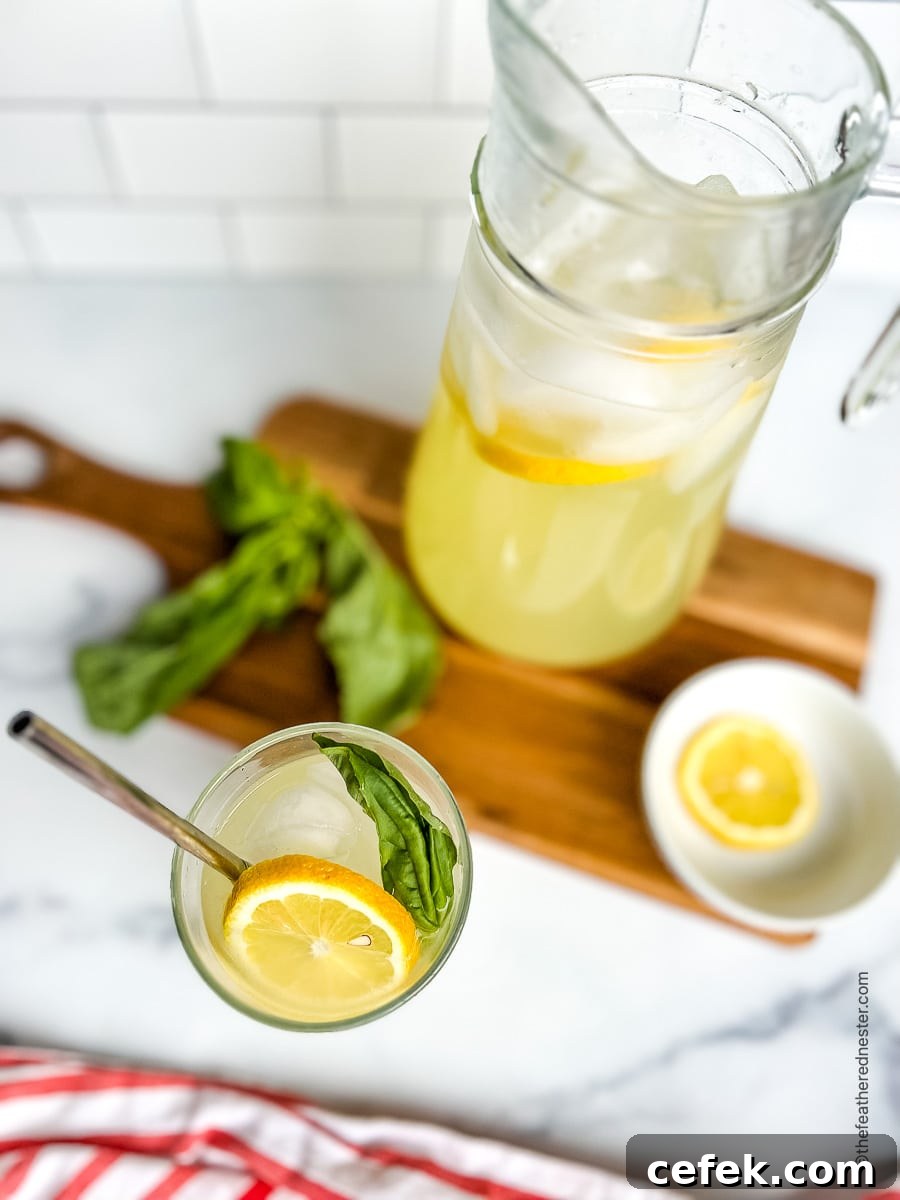 Overhead: looking down into a glass filled with citrus drink