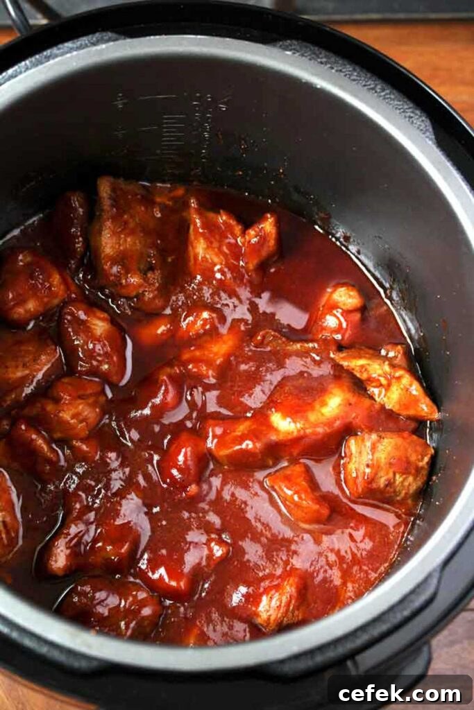Pork pieces and BBQ sauce in the instant pot