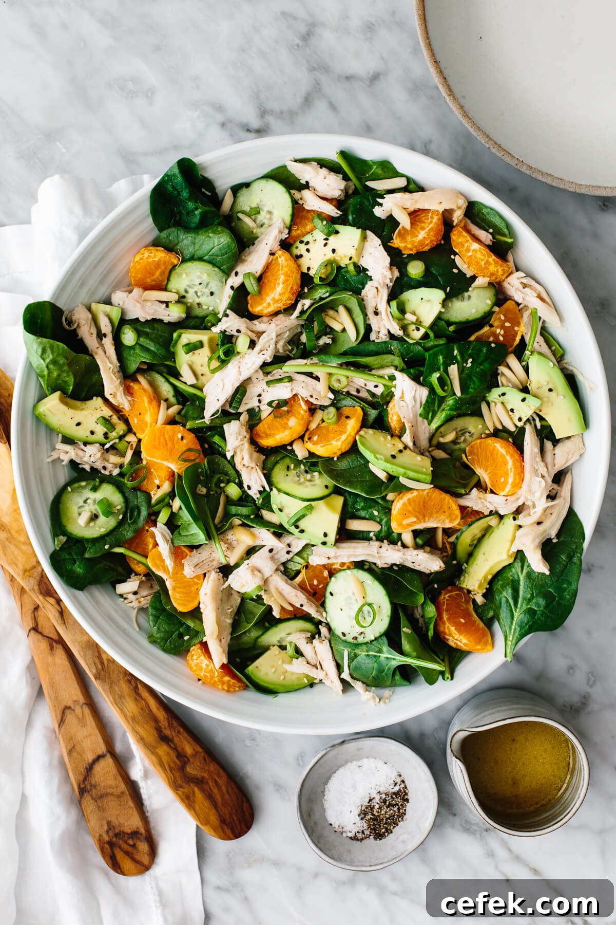 A large bowl of mandarin chicken salad.