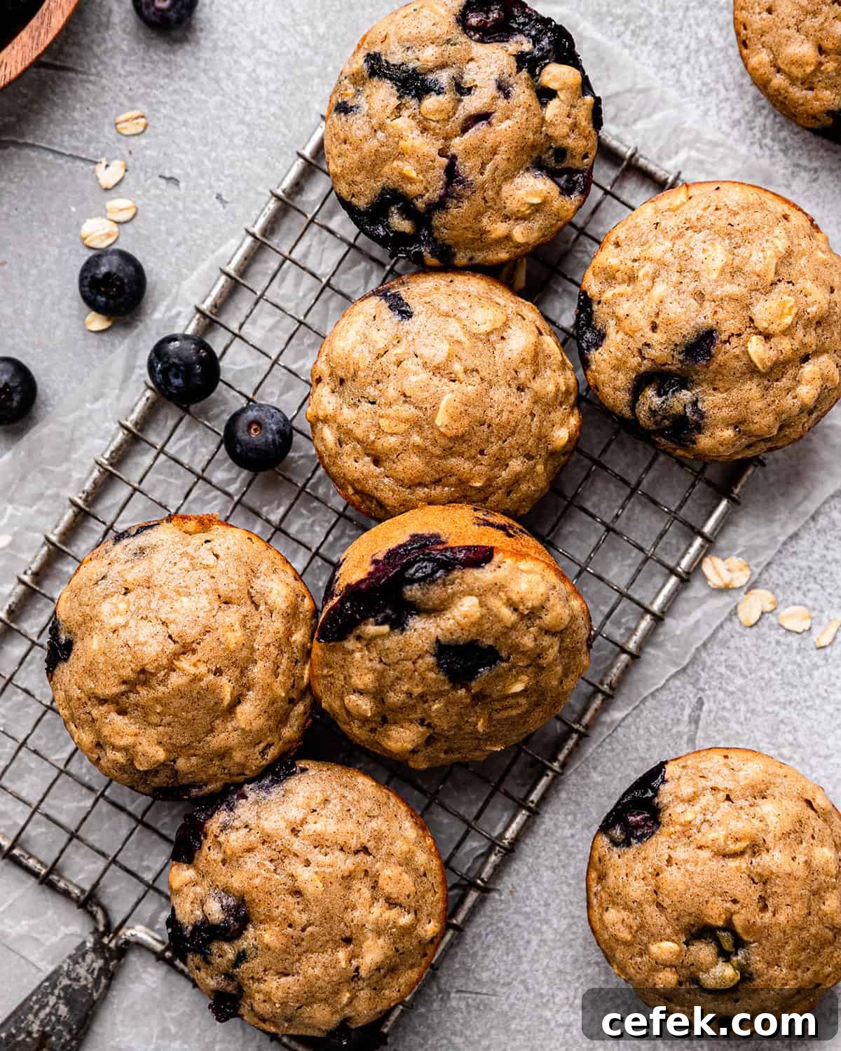 7 Blueberry Oatmeal Muffins on a cooling rack