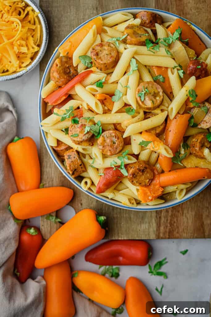 The chicken sausage and pepper pasta is in the top right corner of the frame.