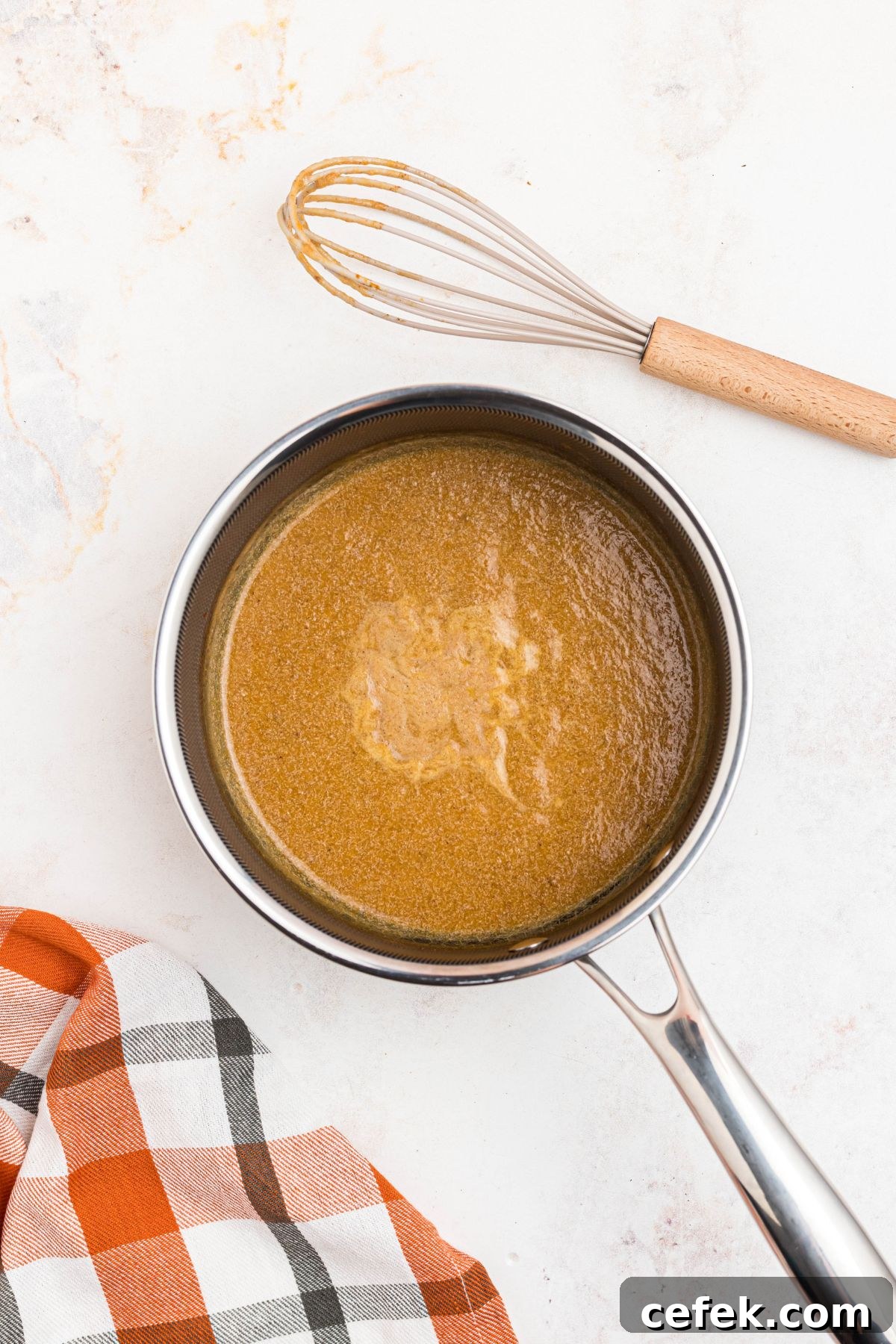 Pumpkin and spice mixture lightly simmered together in a small saucepan. 