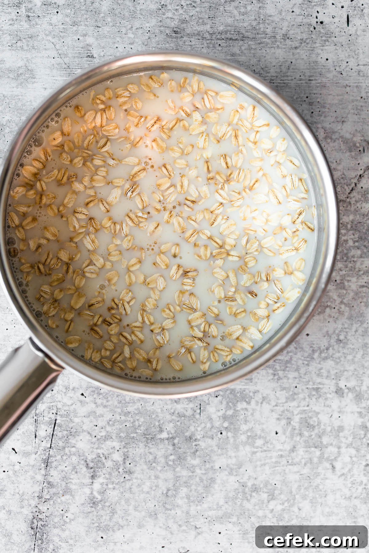 oats and almond milk in a pot