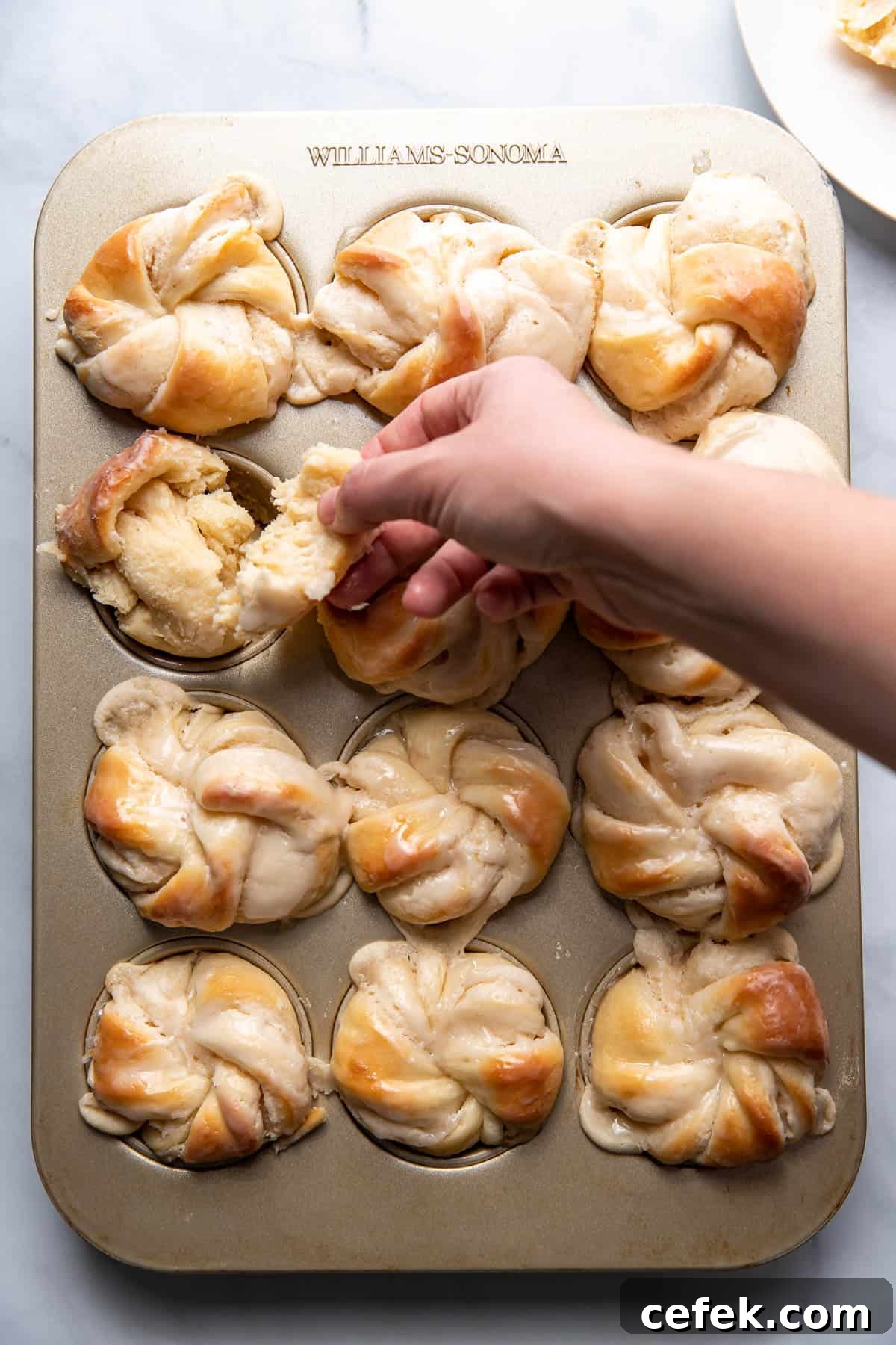 twisty sweet cream cheese muffin bun dessert.