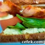 You'll never look at a regular sandwich the same again! This Creamy Crab Salad BLT is the perfect lunch recipe with a secret ingredient you've got to taste!