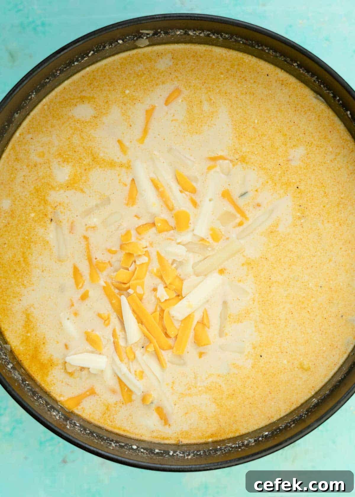 heavy cream and shredded cheese added to creamy mexican street corn soup