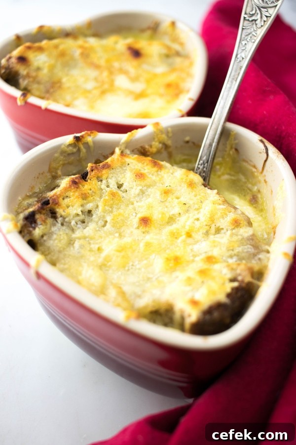 close up of vegetarian onion soup in heart shaped bowls