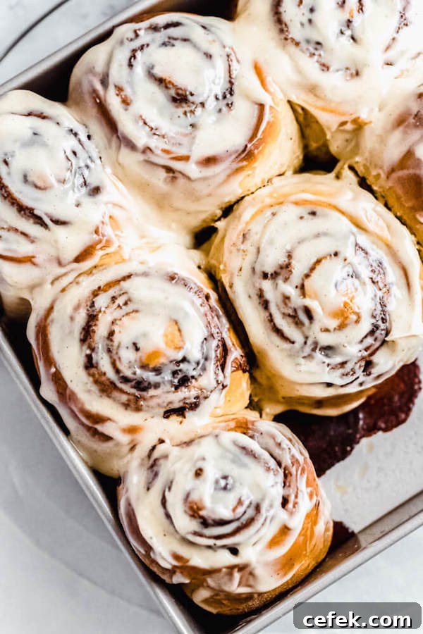 chai latte cinnamon rolls in a square cake pan
