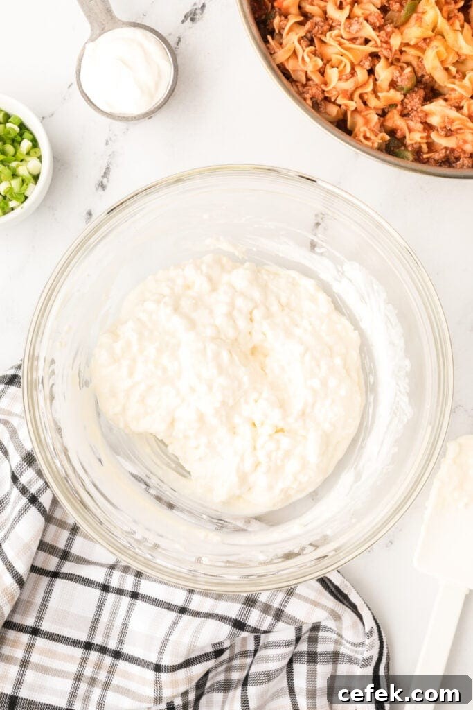 smooth cream cheese and cottage cheese mixture in a glass bowl