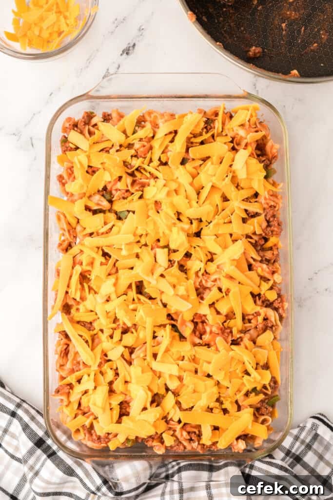shredded cheddar cheese sprinkled over the top of the casserole before baking