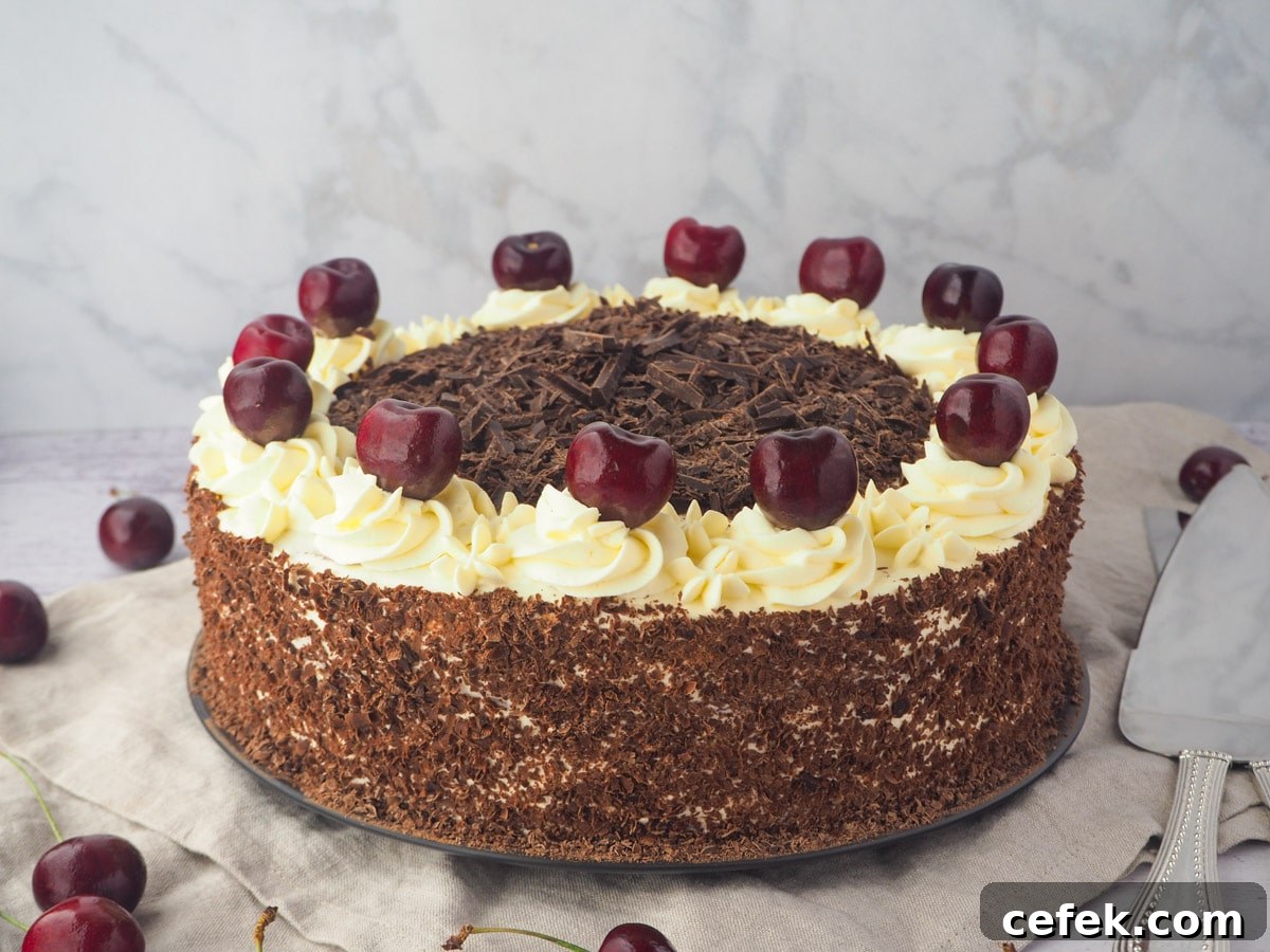 Cake with silver serving ware.