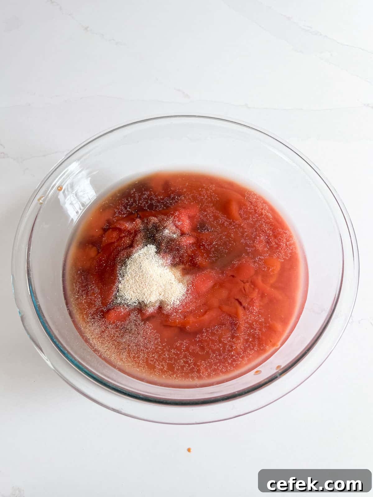 Sauce ingredients in a glass bowl.