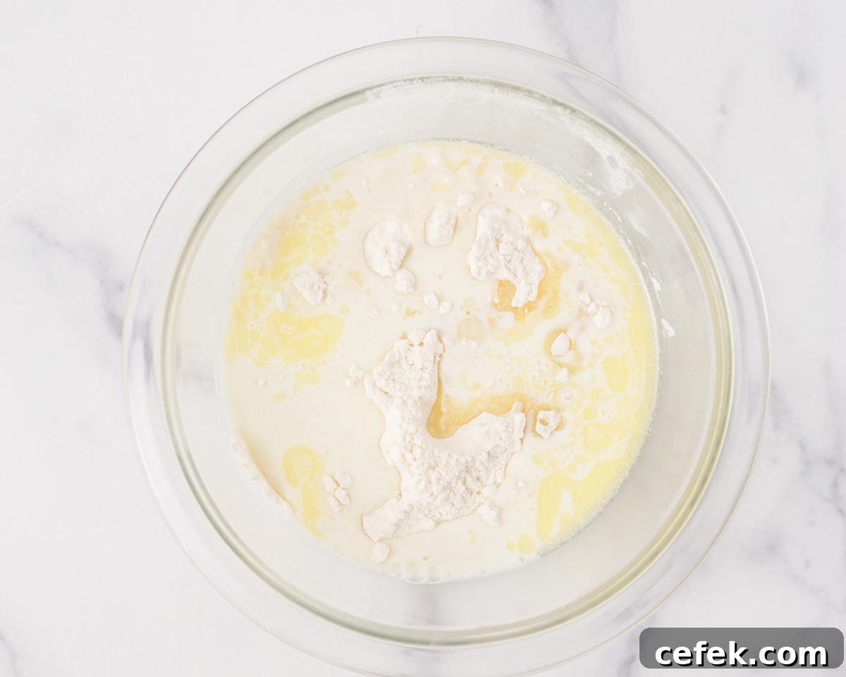 Mixing the dough ingredients together.