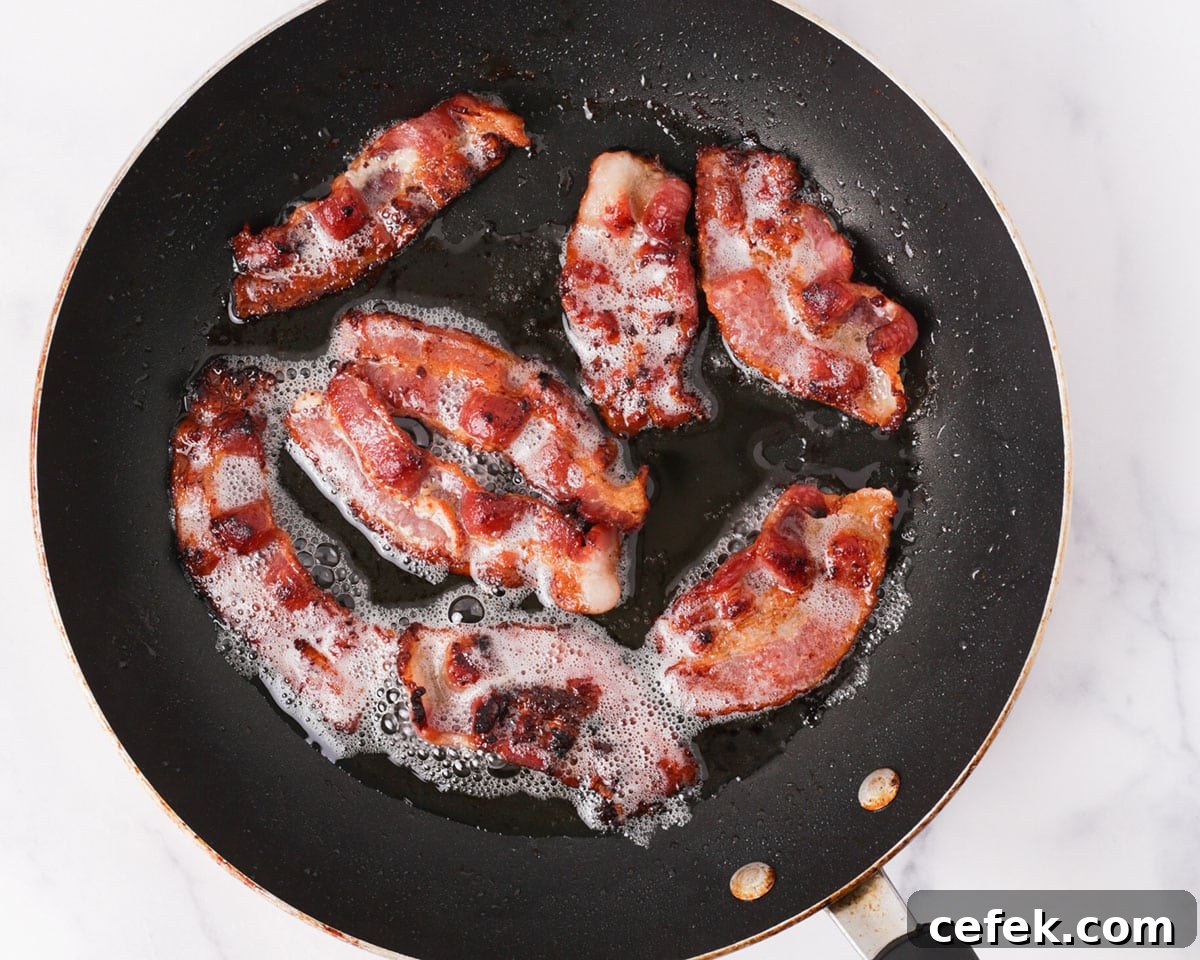 Cooking bacon in the pan.