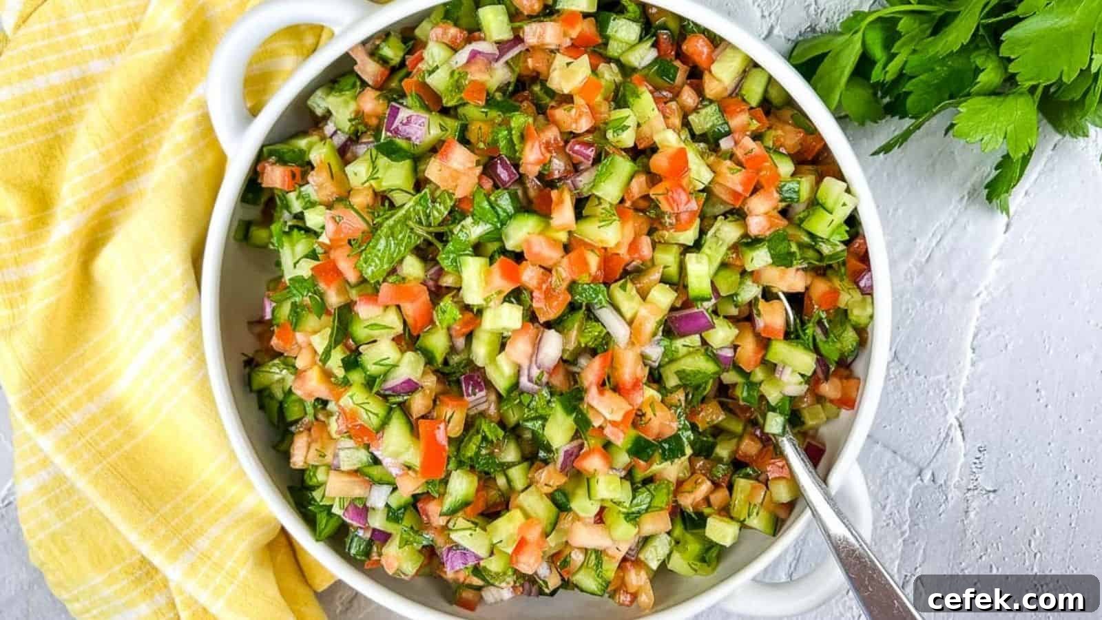 Shirazi Salad in a white serving bowl.