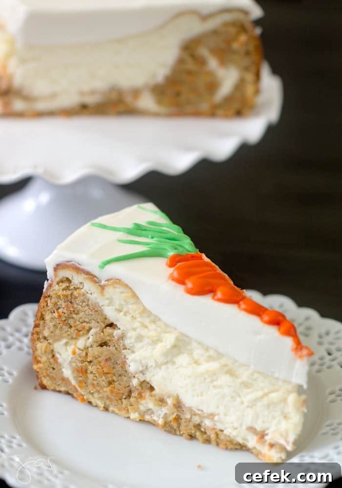 A slice of carrot cake sitting on a white plate.