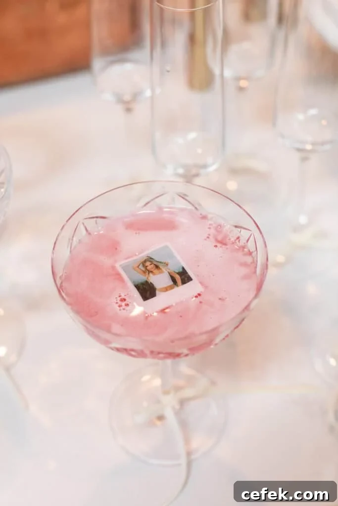 Edible photo made from wafer paper to garnish a pink cocktail.