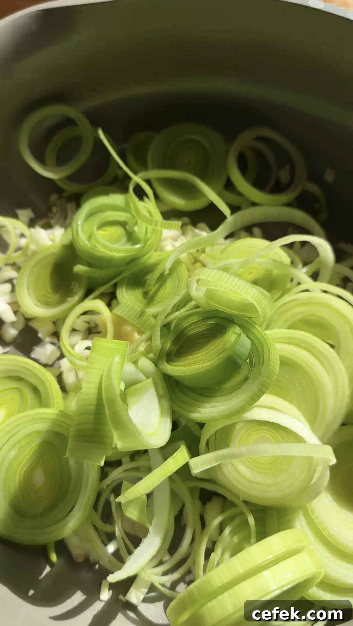 sliced leeks in a large pan