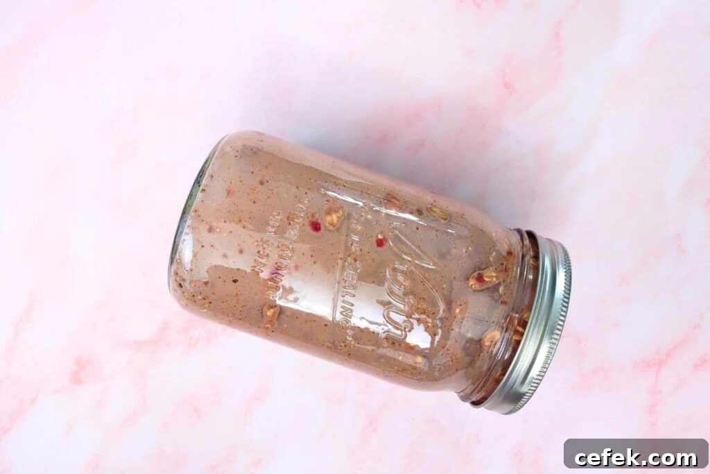 Raspberry Chocolate Overnight Oats Recipe for Morning Boost 5 after adding raspberry and chocolate ingredients shake jar to mix