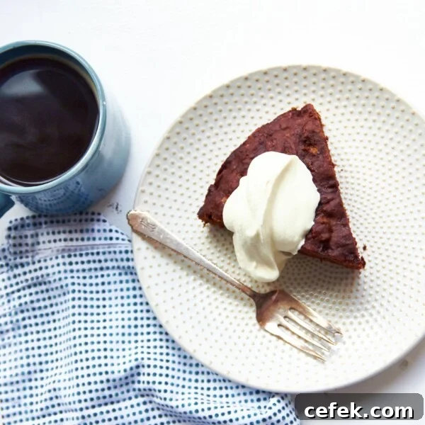 Fork and a slice of Chocolate Banana Cake on a plate.