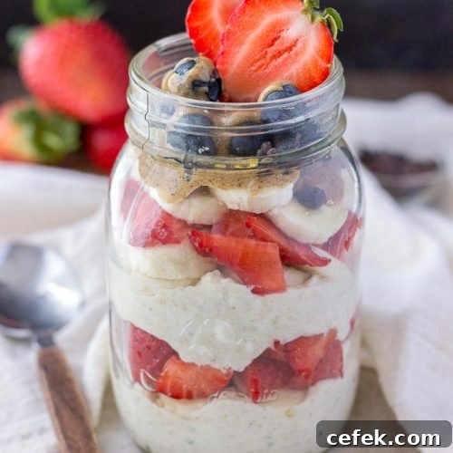 Strawberry overnight oats with yogurt topped with banana and almond butter