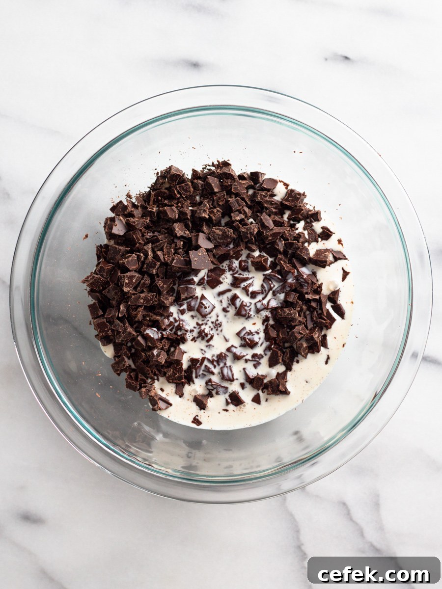 Perfect Chocolate Ganache Recipe for a Smooth, Glossy Finish 5 Chopped chocolate mixed with heavy cream.