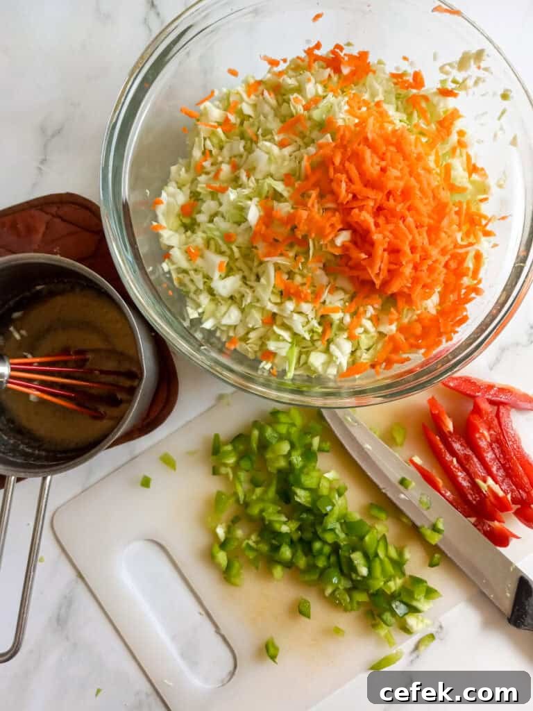 Amish Pepper Cabbage: Tangy Country-Style Side Dish 5 chopped vegetables in a bowl, chopping peppers on a cutting board, dressing on the side.