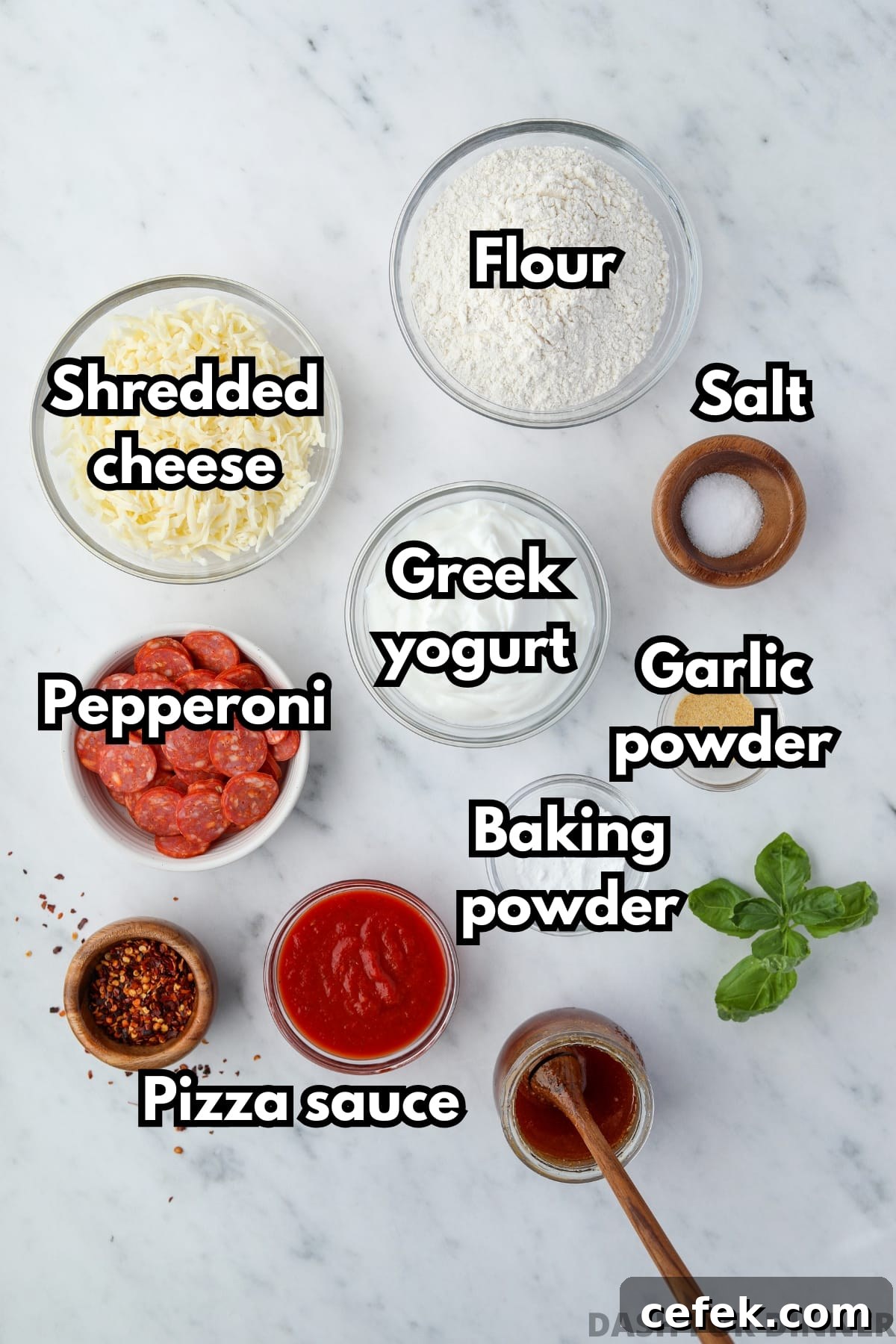 Greek Yogurt Pizza Recipe with Crispy Thin Crust 3 Bowls of the ingredients needed to make greek yogurt pizza, including greek yogurt, flour, and shredded cheese.